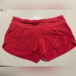 LULULEMON size 6 Sonic pink speed up shorts 2.5”